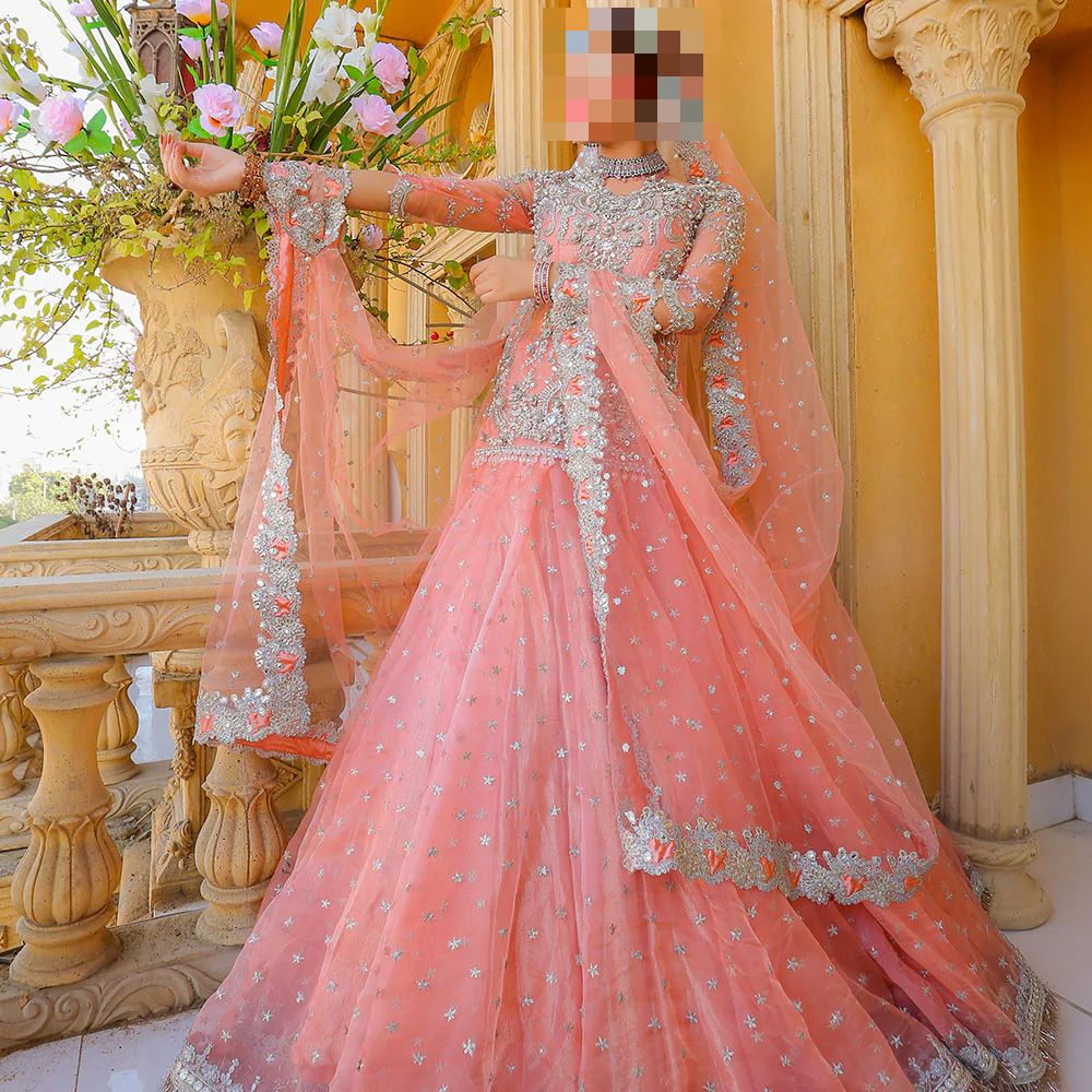 Fatima’s Peach Pink Bridal Lehenga