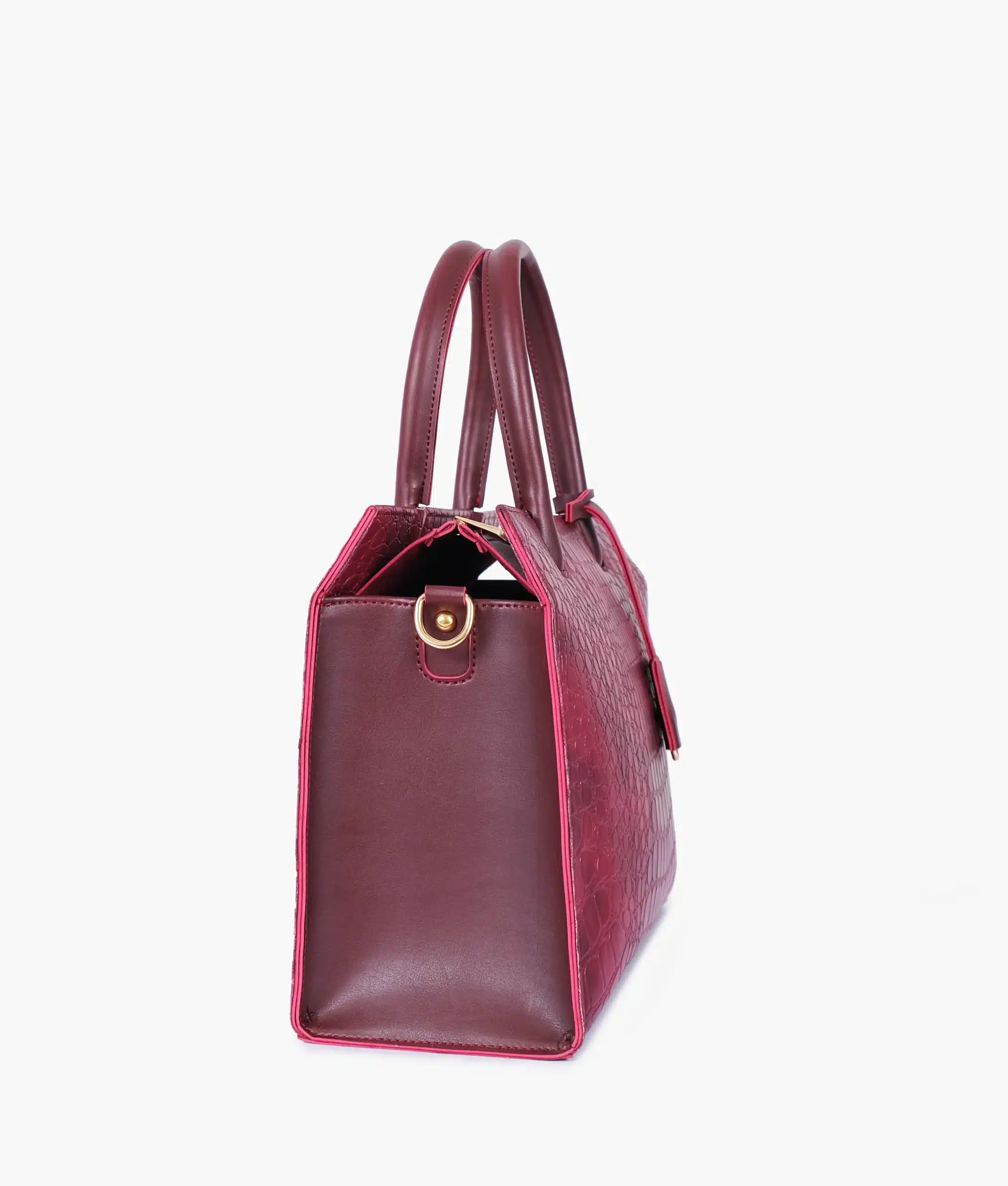 Vintage style burgundy handbag with spacious compartments and adjustable strap