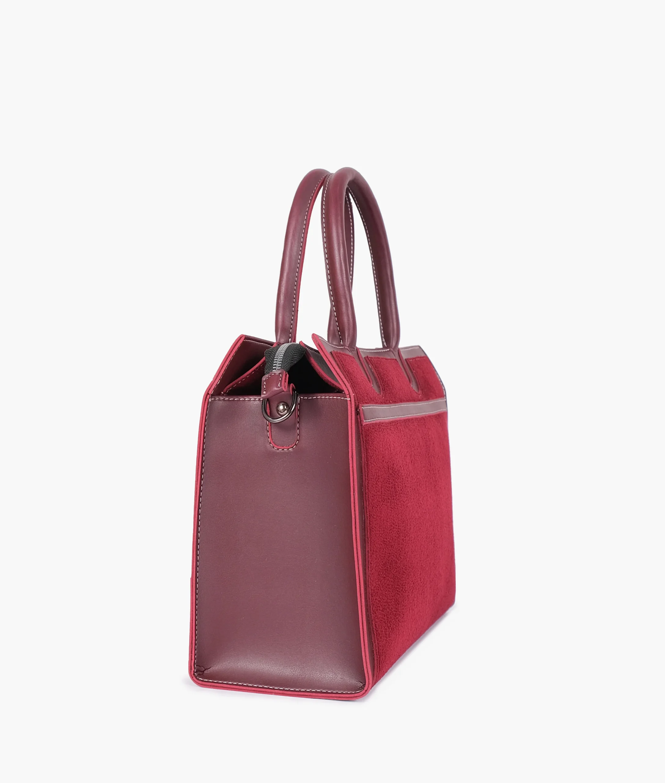 Burgundy suede vintage handbag with structured design and multiple compartments