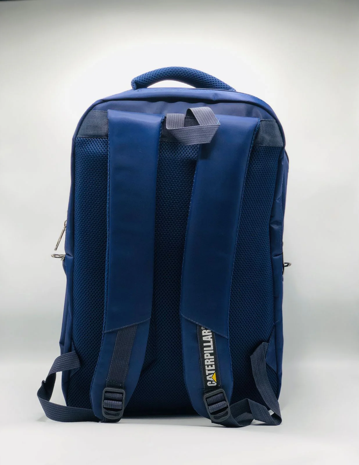 Durable Caterpillar Blue School Backpack featuring a rugged design, spacious compartments, and strong stitching, perfect for everyday school and travel use.
