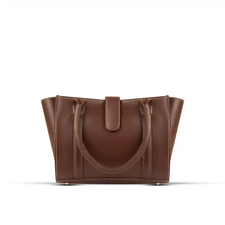 Coral chocolate handbag with sturdy handles and compact structured shape
