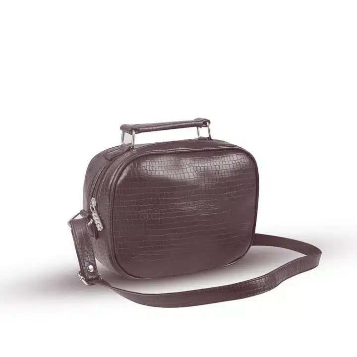 Modern edge choco handbag styled for everyday use with sleek finish and sturdy handles