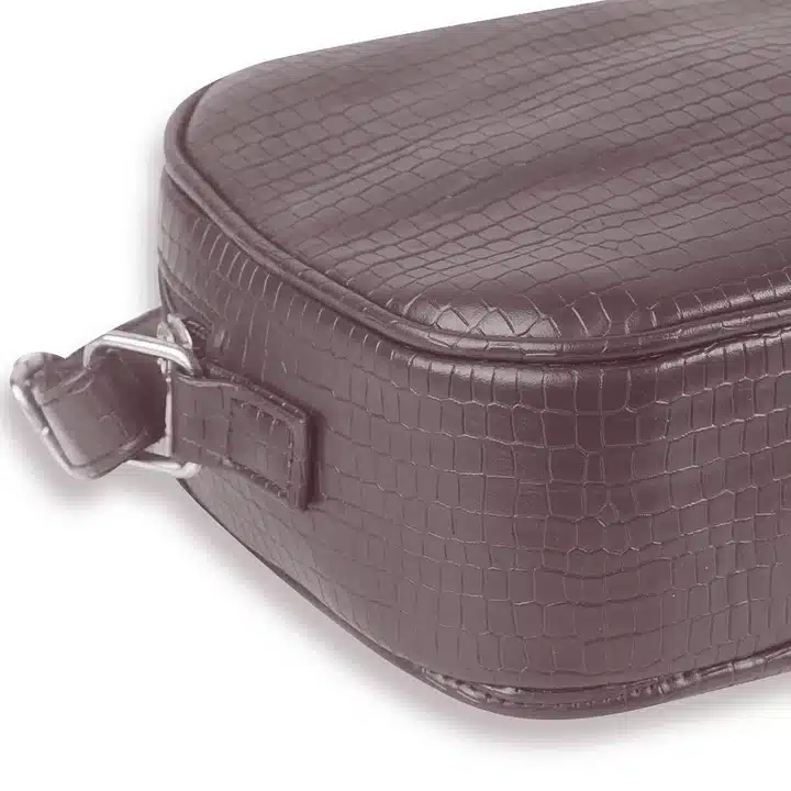 Elegant edge choco handbag with organized interior and structured shape