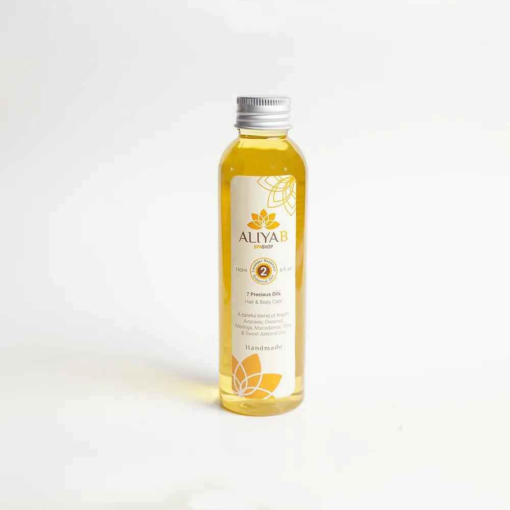 Close-up design of aliya b 7 precious hair & body care hand made oils, 150ml