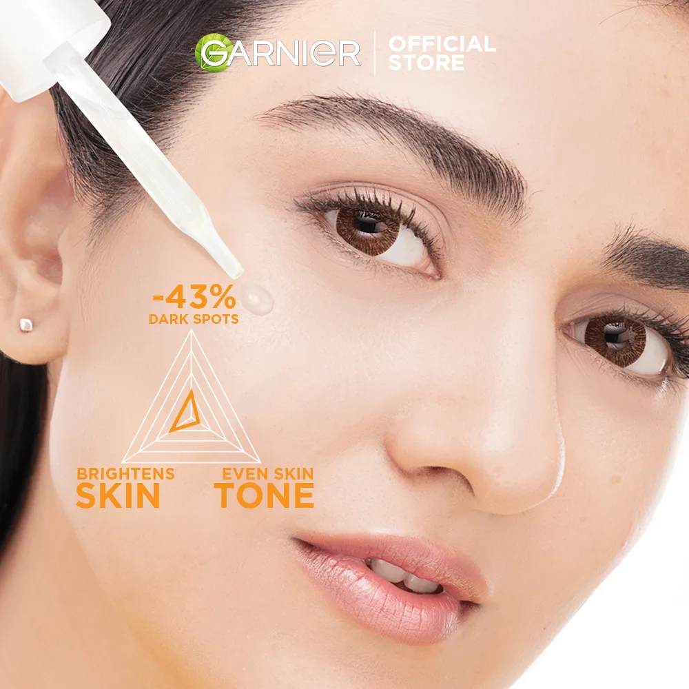 Close-up design of garnier skin active bright complete vitamin c booster serum 30 ml - contains niacinamide