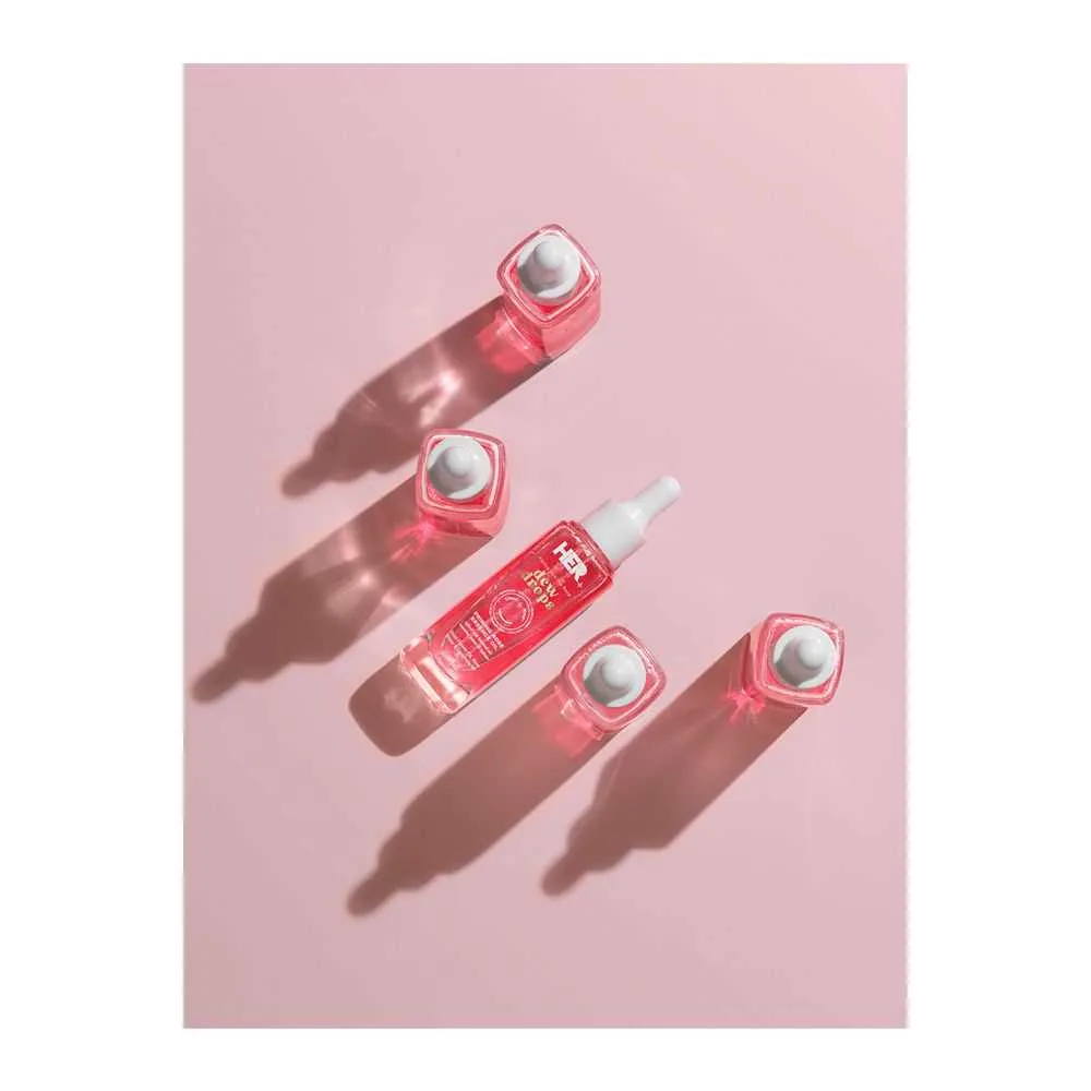 Close-up design of her beauty dew drops priming rose essence oil, 30ml