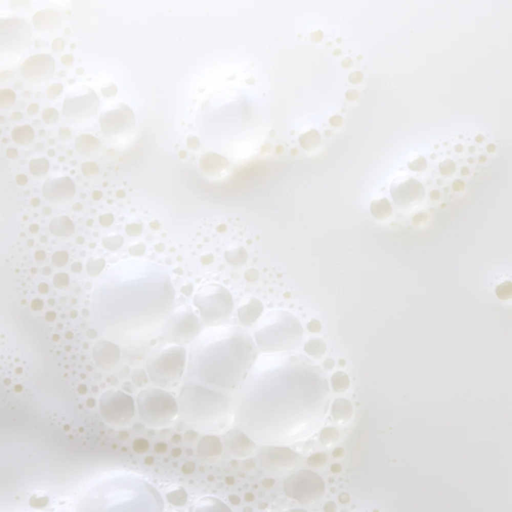 Side view of skin deep dream glaze peptide milk toner, glycerin, niacinamide, shea butter, for all types of skin, 100ml